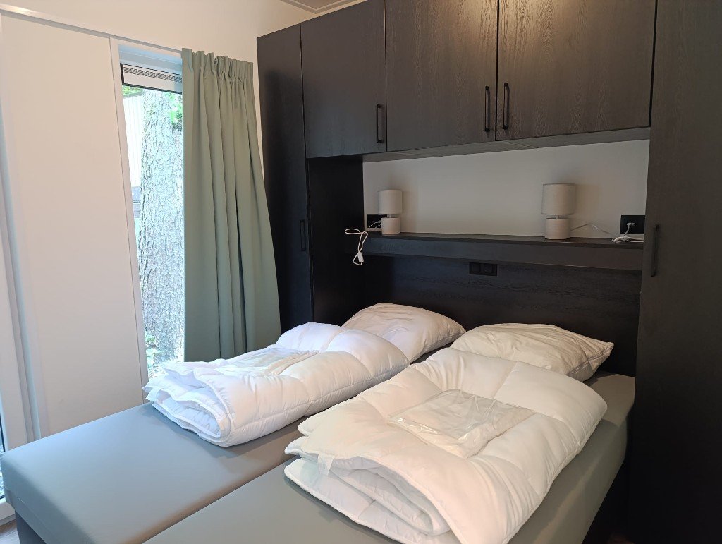Slaapkamer van het vakantiehuis op de Veluwe